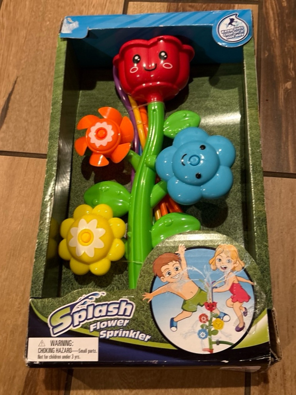 Splash Flower Sprinkler Toy in Red, Orange, Yellow, Blue, Green